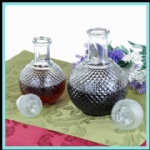 fancy glass wine bottle with glass cap